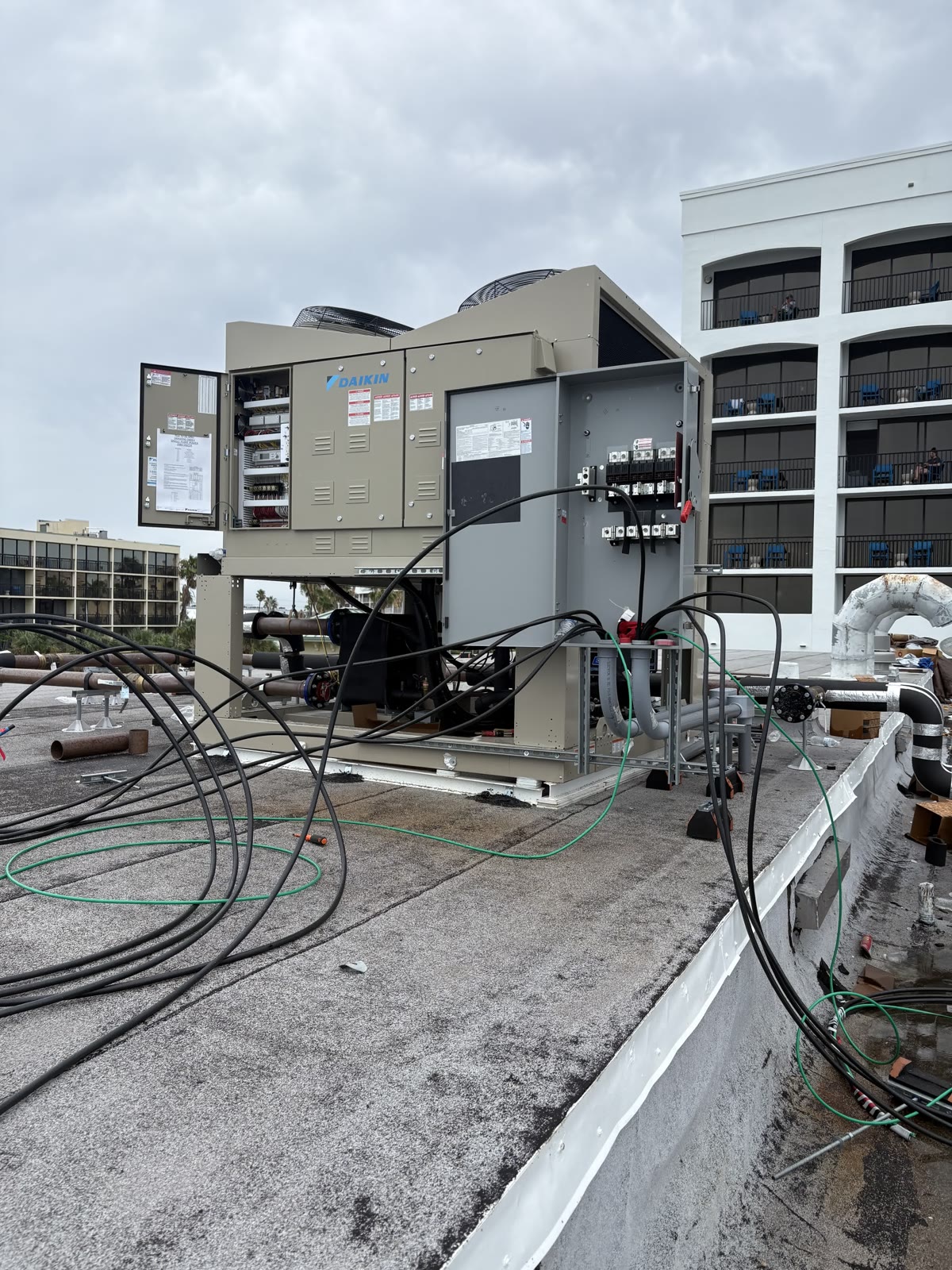 Rooftop commercial electrical and conduit serviced by Brightwire Electric