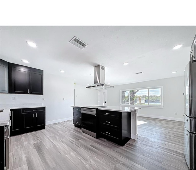 Kitchen with recessed LED lighting installed by Brightwire Electric