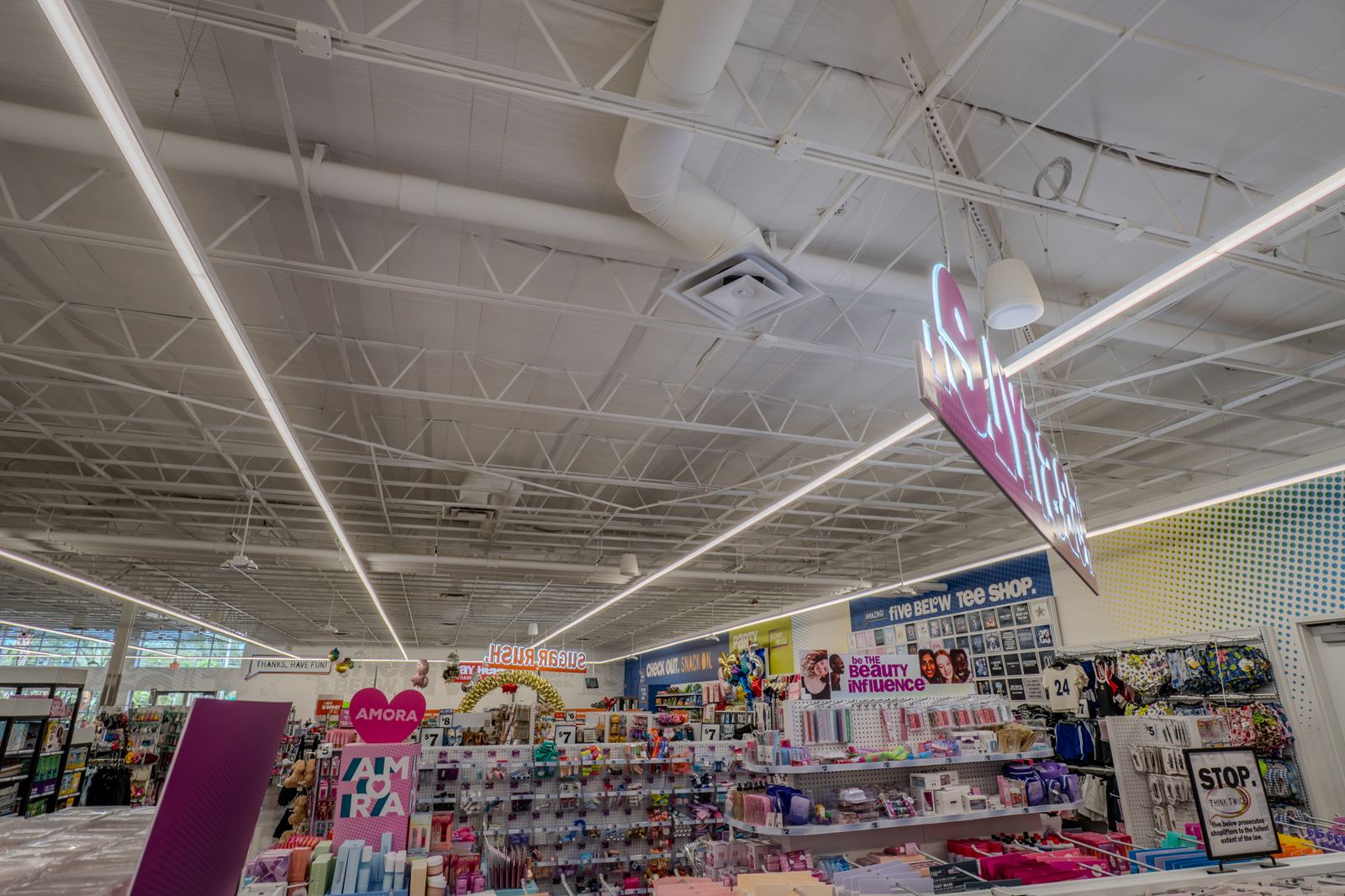 Linear LED lighting across a retail sales floor, a Brightwire Electric commercial project