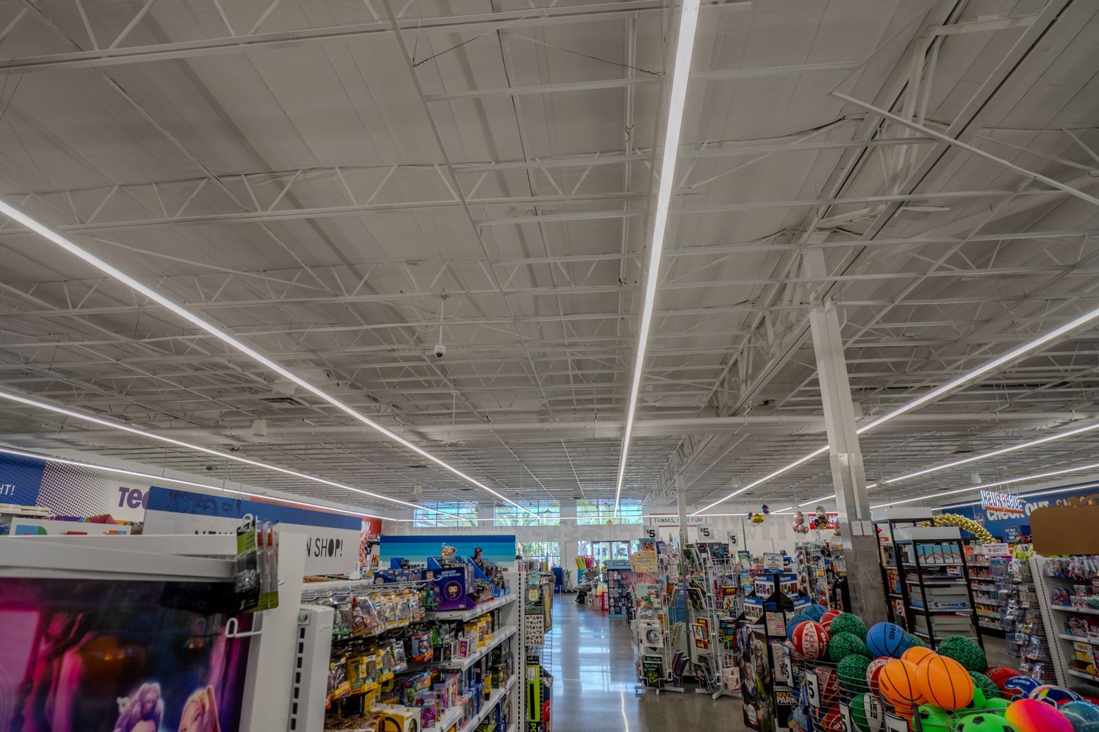 Commercial linear LED lighting over retail aisles, a Brightwire Electric project