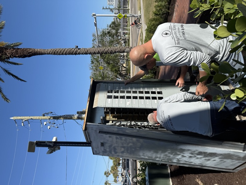 Brightwire Electric team working on electrical panel in Hudson, Florida